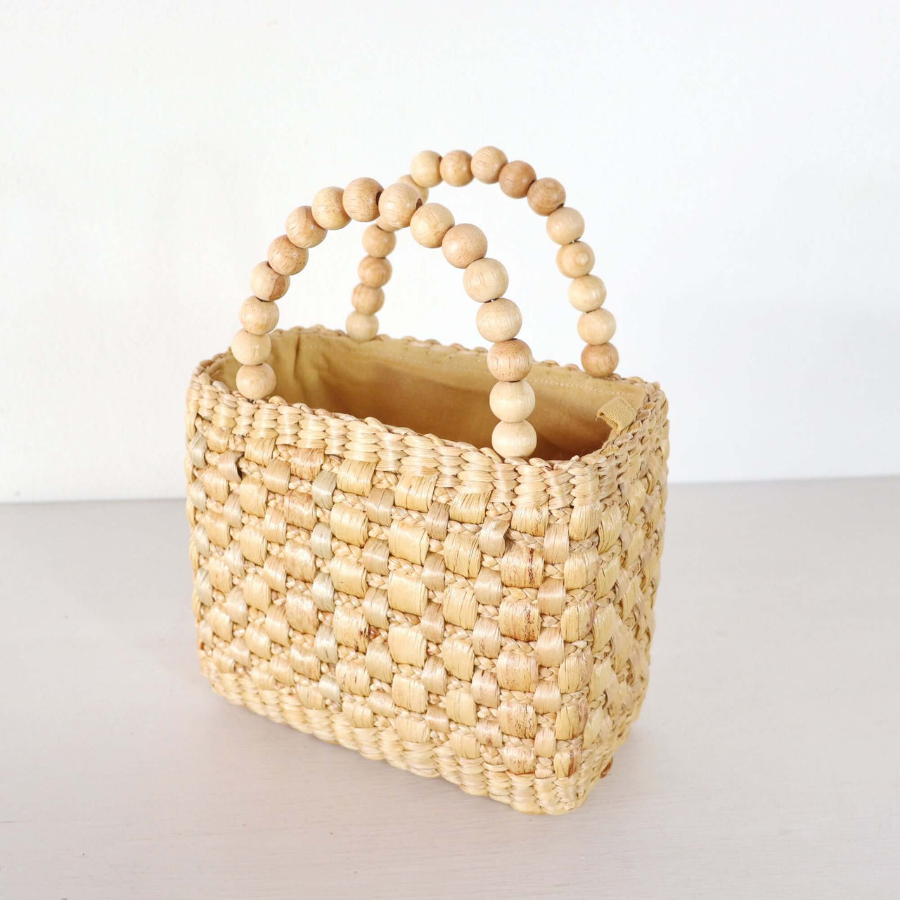Ratsame — compact straw handbag for festivals and markets