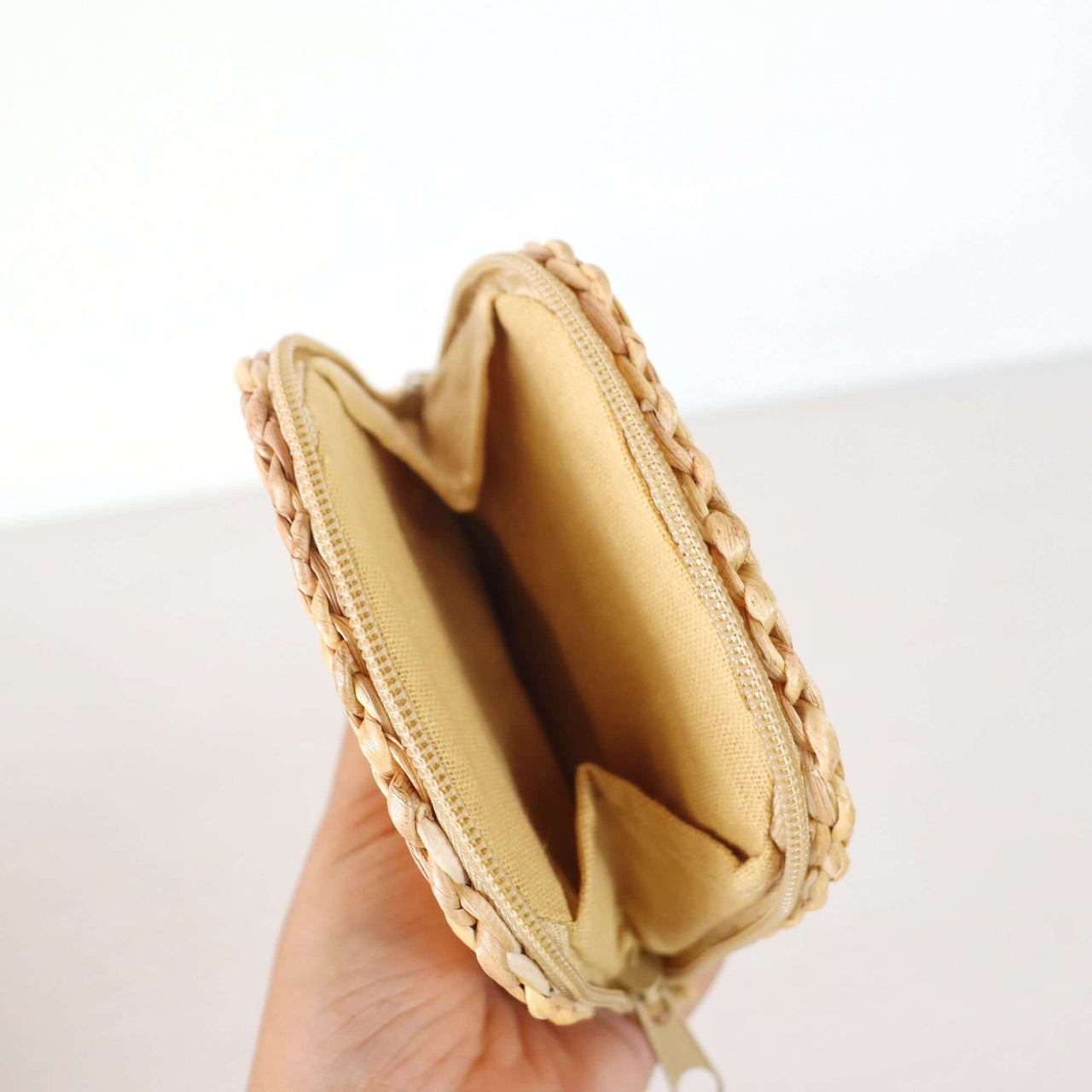 Handmade woven straw — straw wallet styled for summer beach outings