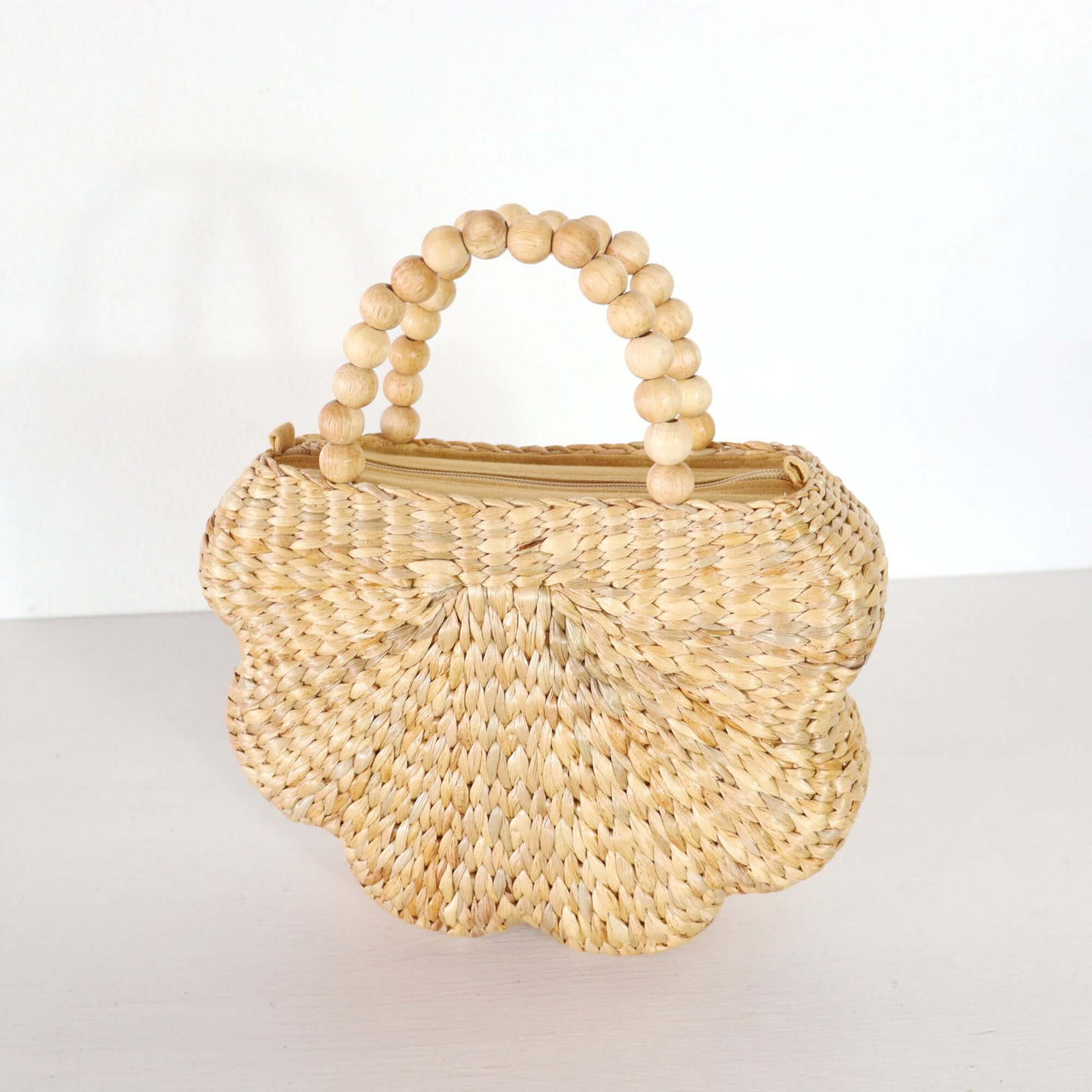 Valee — handwoven straw handbag with a soft, natural weave