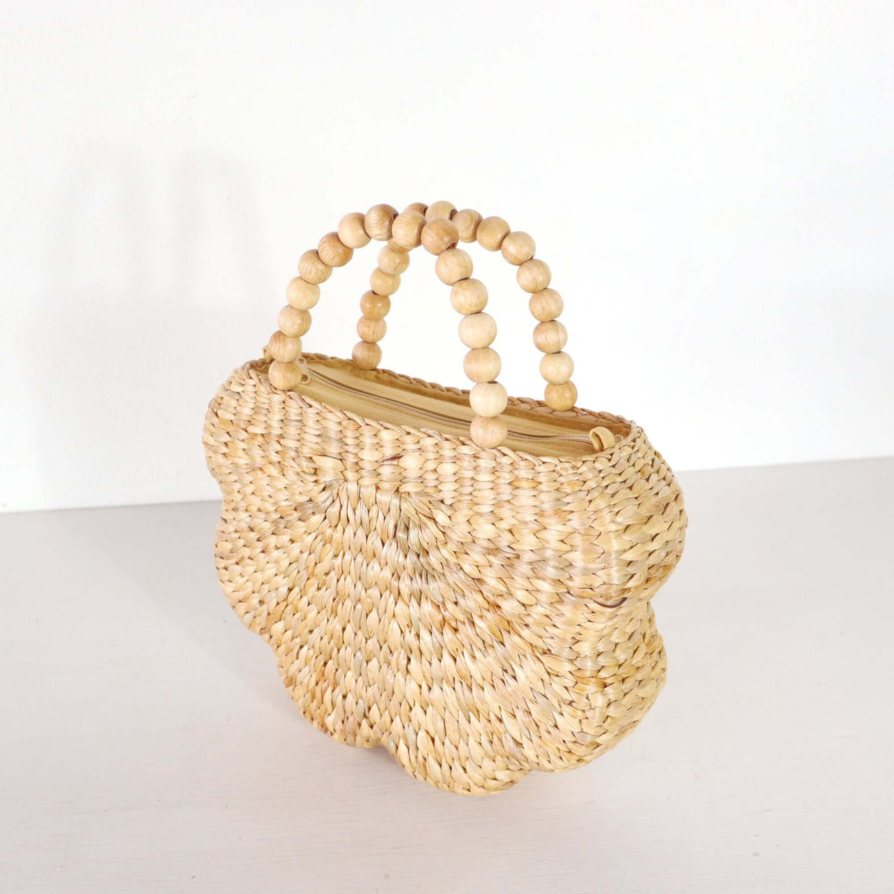 Valee — straw handbag styled for summer beach outings