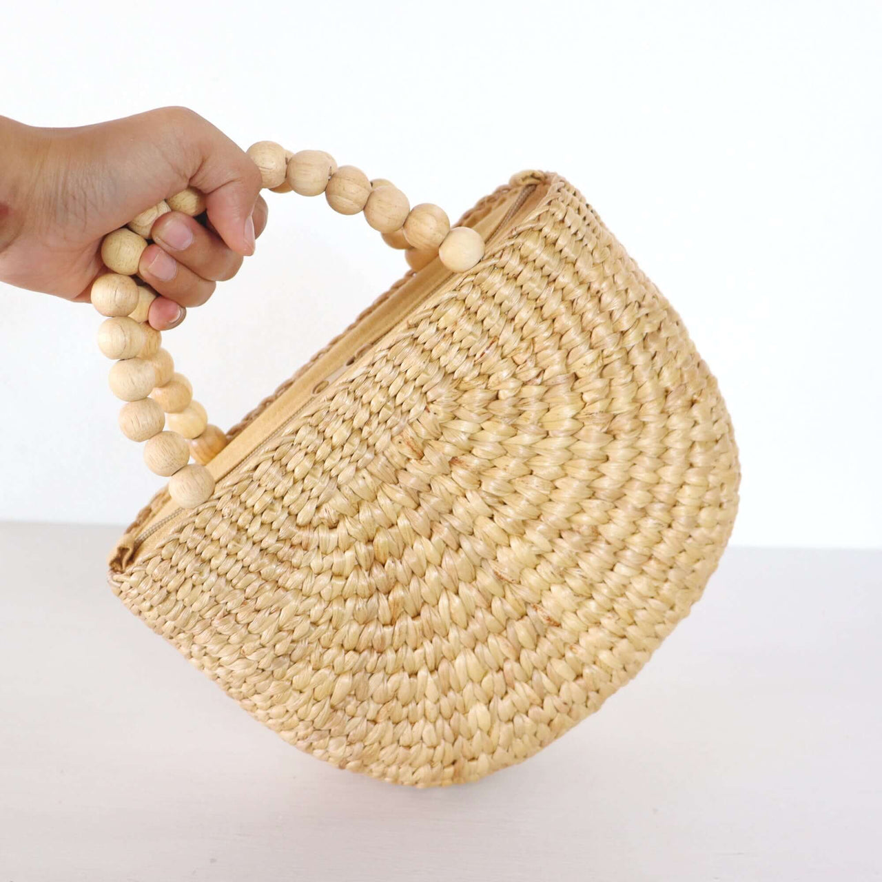 Lanee — natural straw handbag with an artisan woven finish