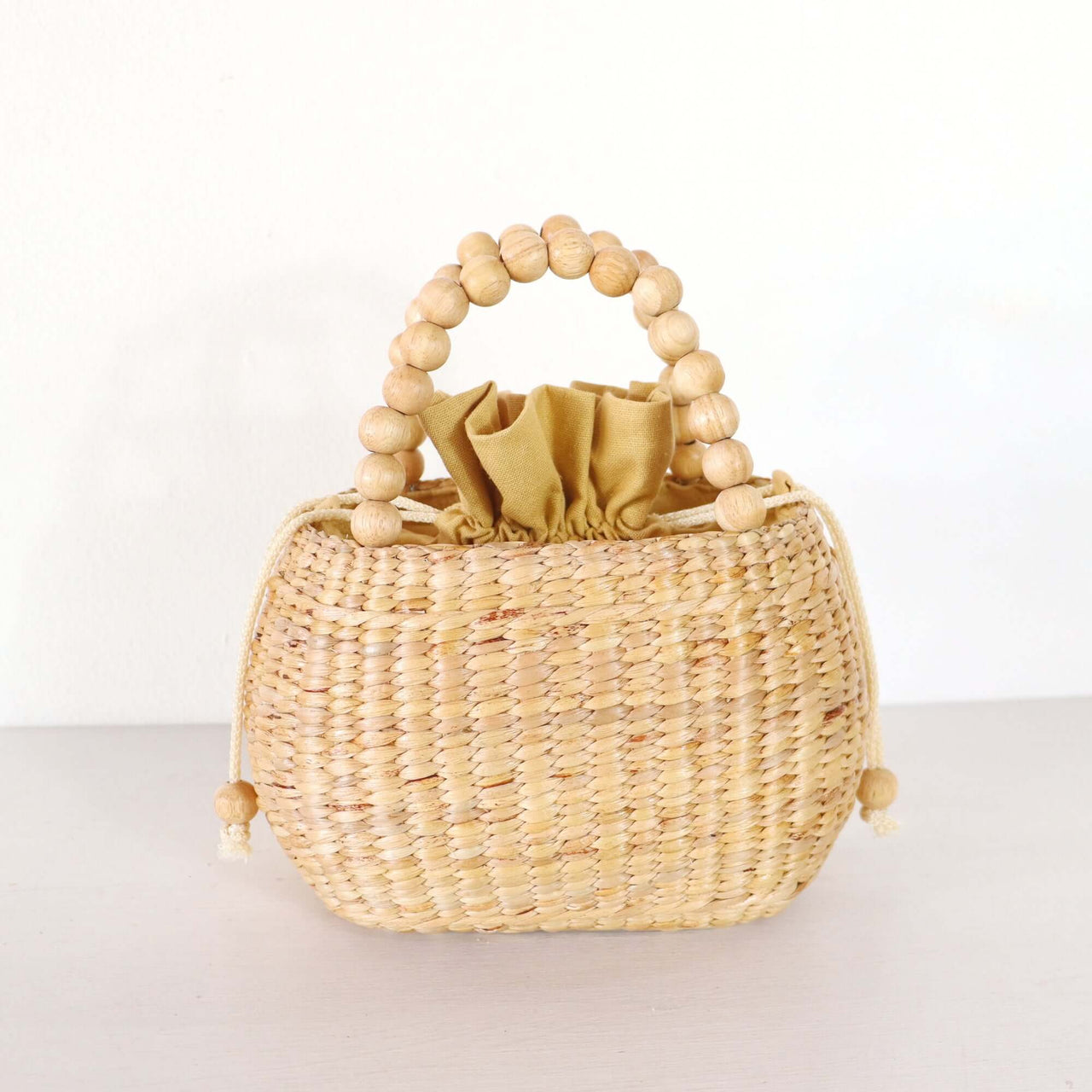 Laranee — handwoven straw handbag with a soft, natural weave