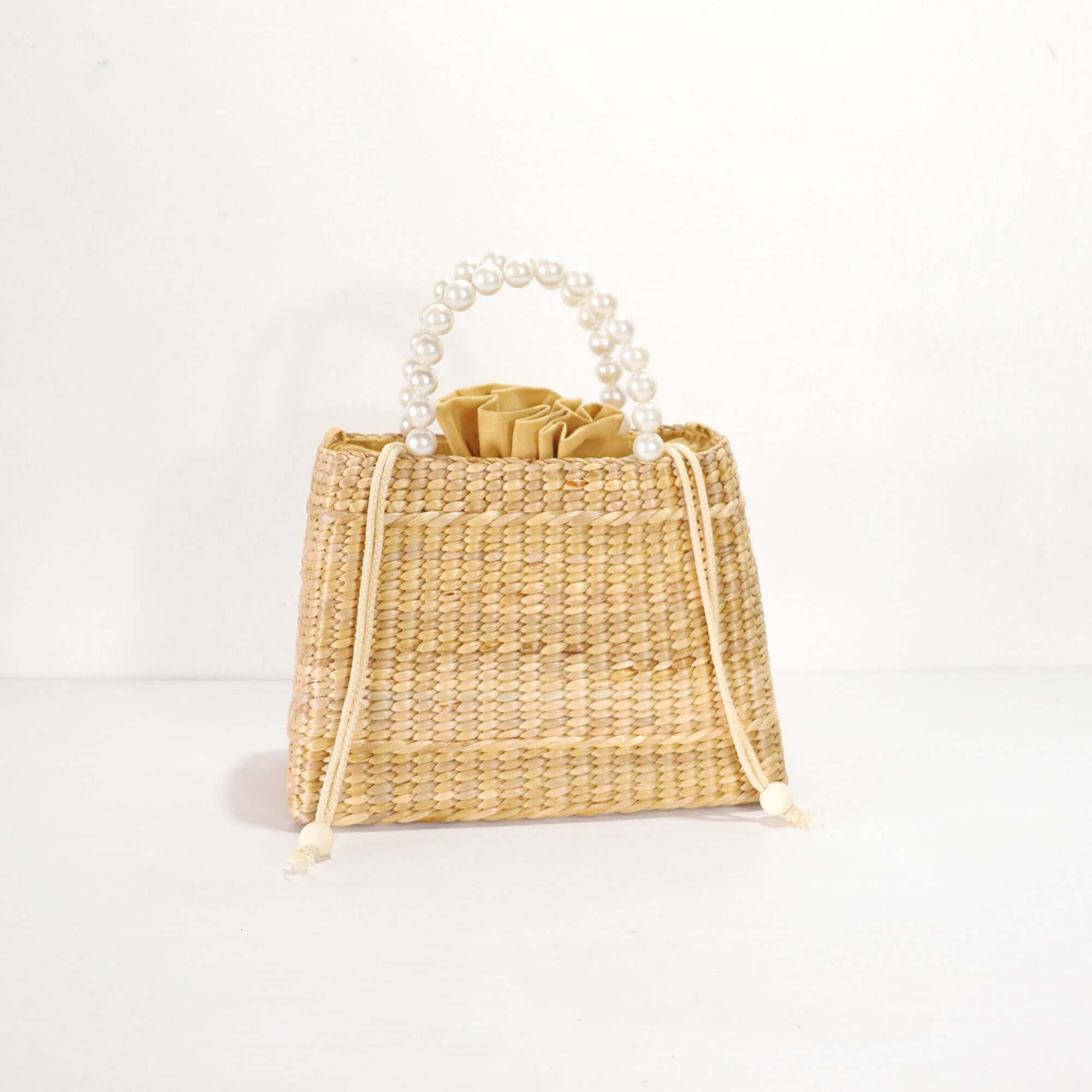 Lala — straw handbag styled for summer beach outings