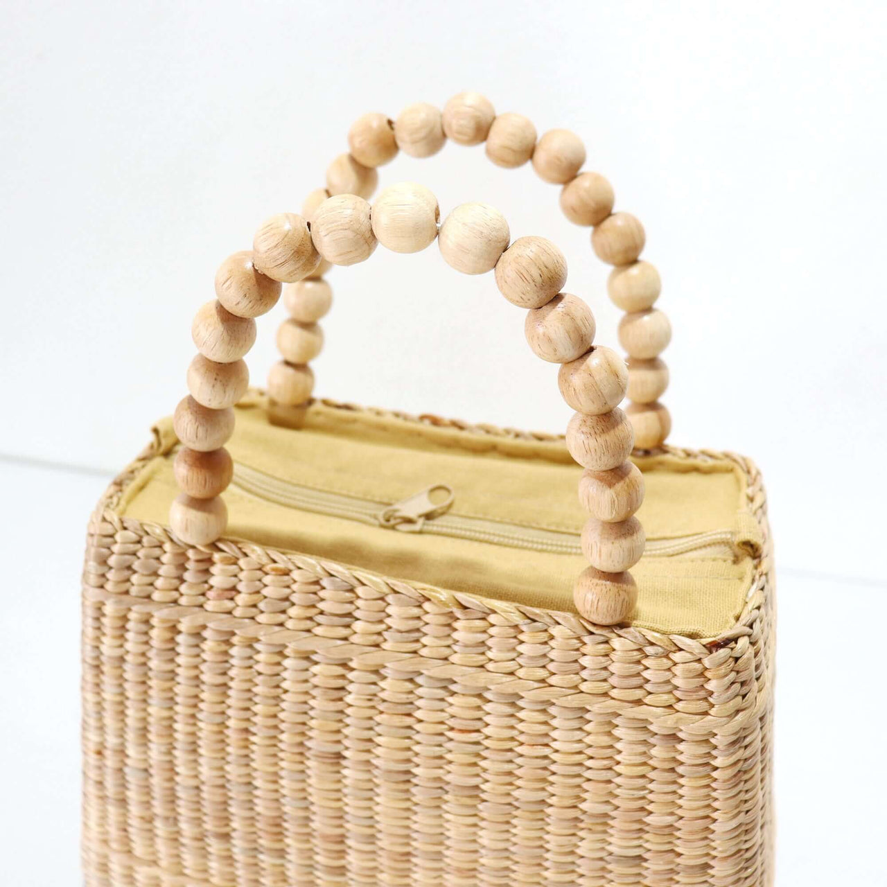 CHALA — straw handbag with a relaxed, vacation-ready look