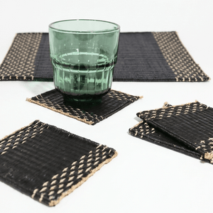 Lavila Handwoven Coaster Set of 4 featuring black woven centers with natural edges, ideal for modern and minimalist decor.